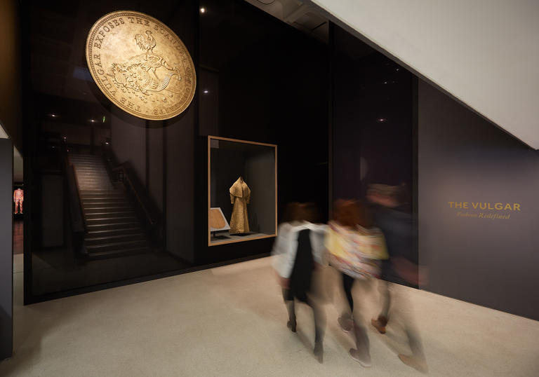 Visitors entering The Vulgar exhibition at the Barbican