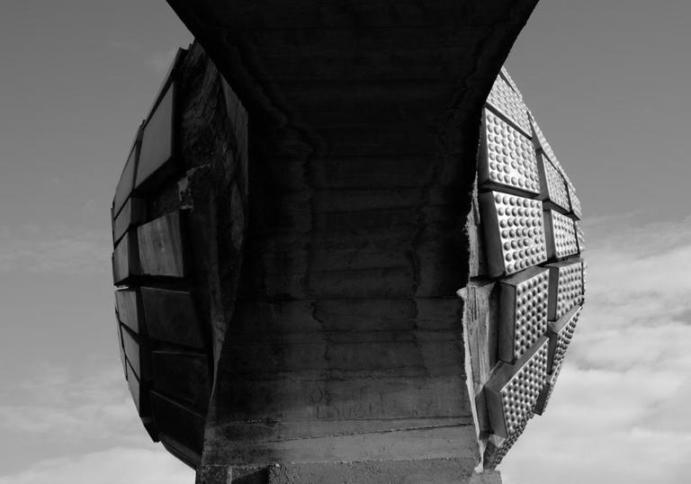 A still image from Last and First Men depicting a dilapidated building