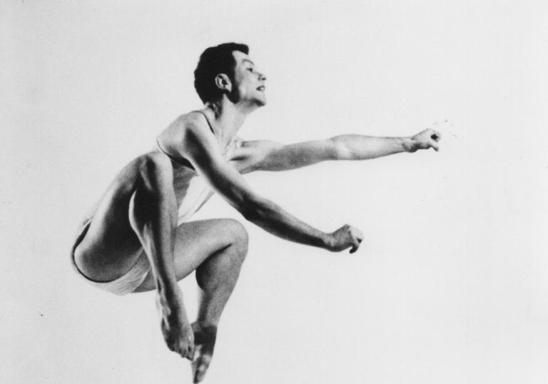 male dancer jumping mid air