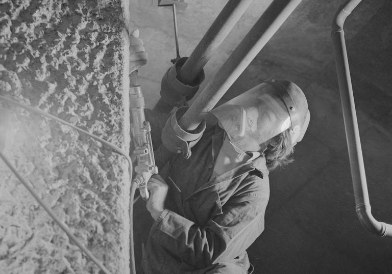 Man drilling concrete