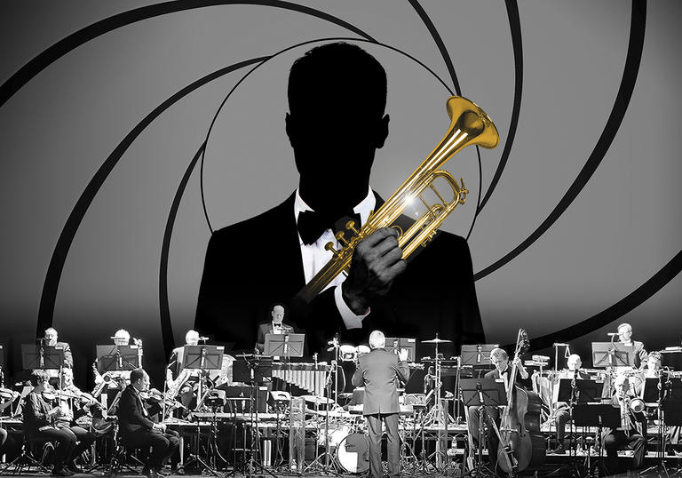James Bond holding a trumpet behind an orchestra