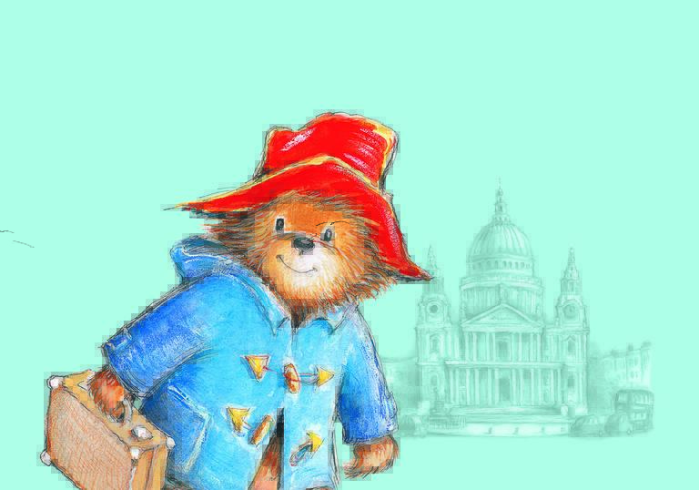 Paddington Bear standing outside St Paul's Cathedral