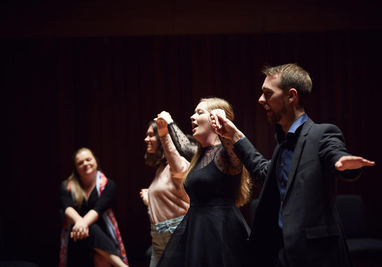 Guildhall singers perform on stage