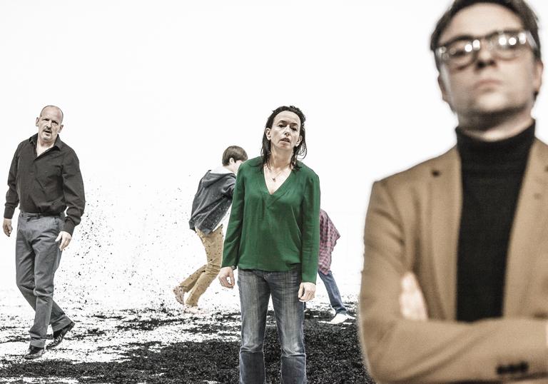 A group of people staring at the camera