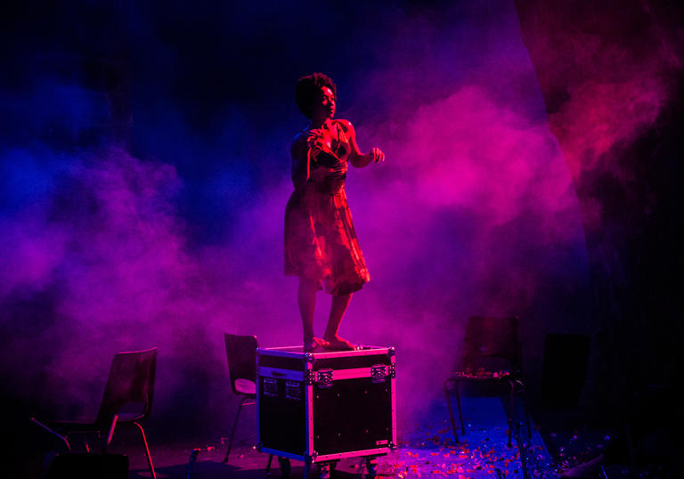 Woman dancing in smoke