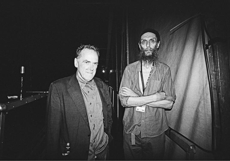 A black and white photo of Charles Haywward and Charles Bullen standing backstage