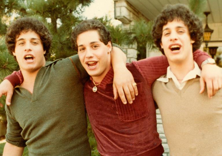 Three Identical Strangers