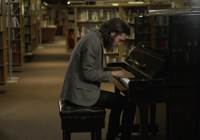 Keaton Henson on the piano in the Library