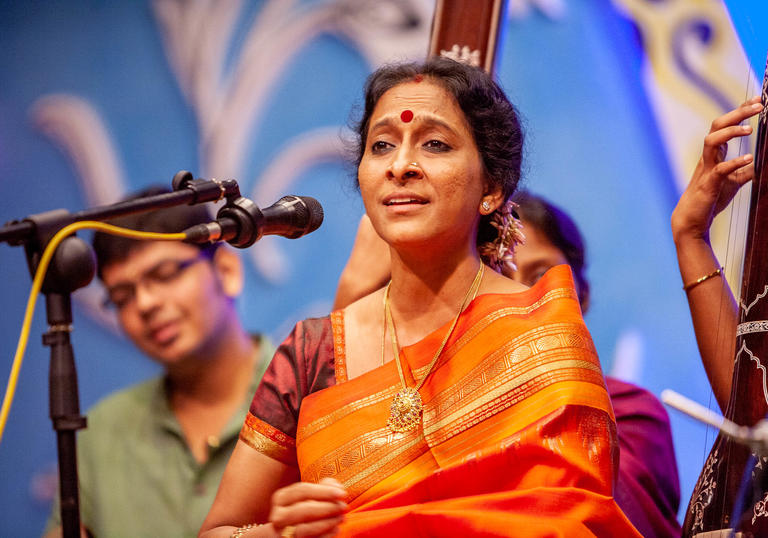 Bombay Jayashri singing, with musicians behind her