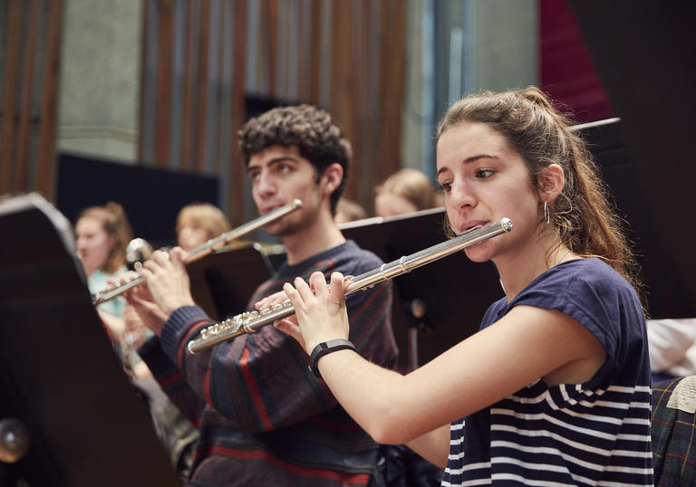 Two flautists in Guildhall Symphony Orchestra