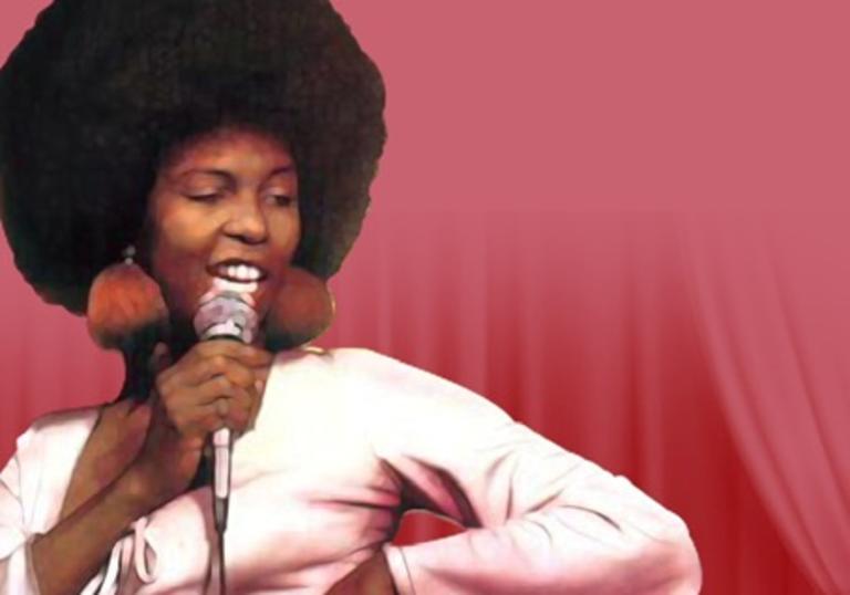 Betty Wright with one hand on her hip