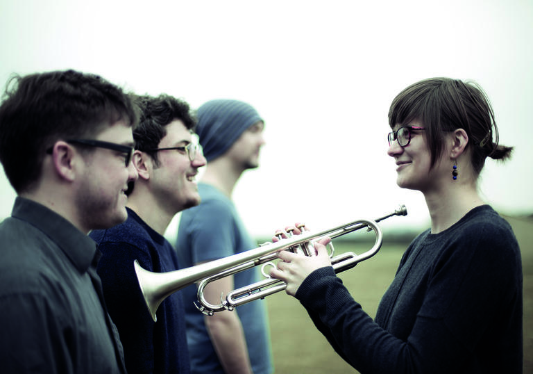 dinosaur band, Laura Jurd holding trumpet