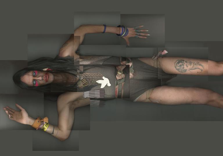 A full body scan image of Christeene wearing a grey leotard and long boots, she has a tattoo on her left thigh