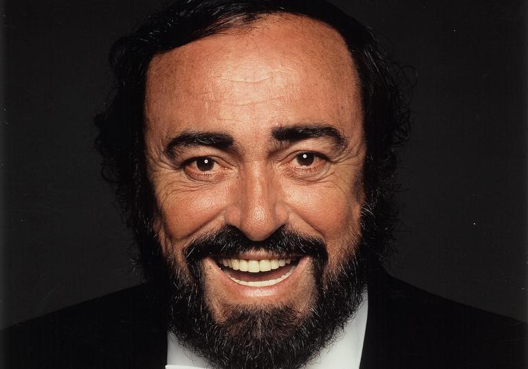 Image of smiling Pavarotti in bow tie