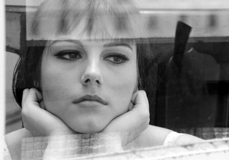 woman looking out of window