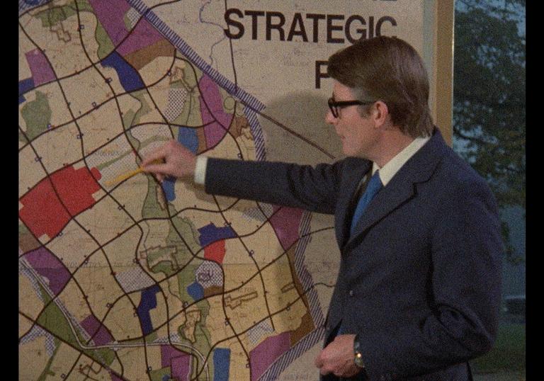 Man standing by map