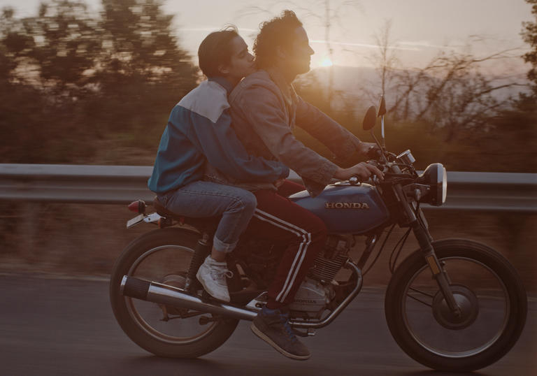 two people on motorbike