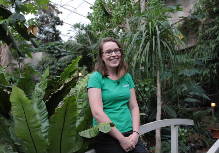 photo of marta lowcewicz laughing in the conservatory