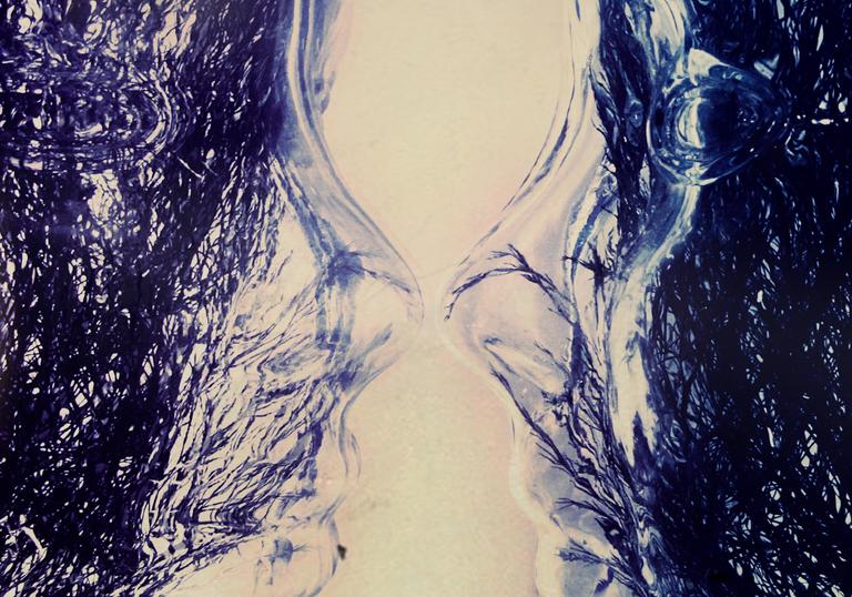 Two faces formed of water looking directly at each other