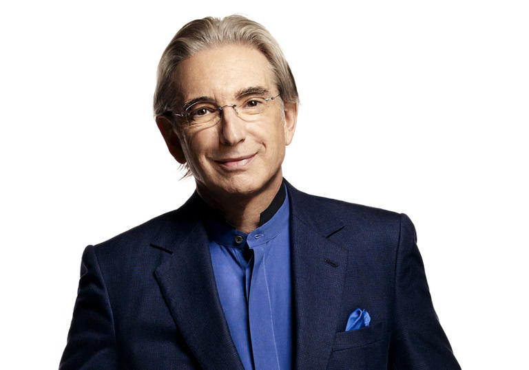 Photo of conductor Michael Tilson Thomas on a white background