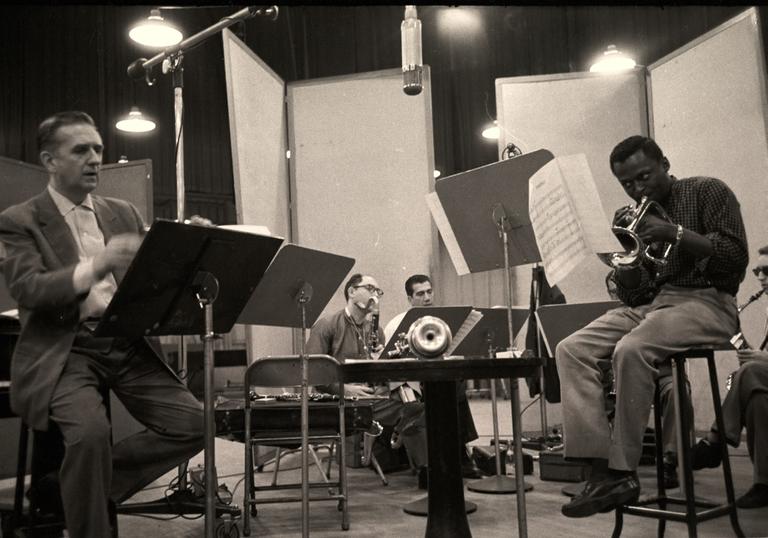 Miles Davis playing trumpet in the studio