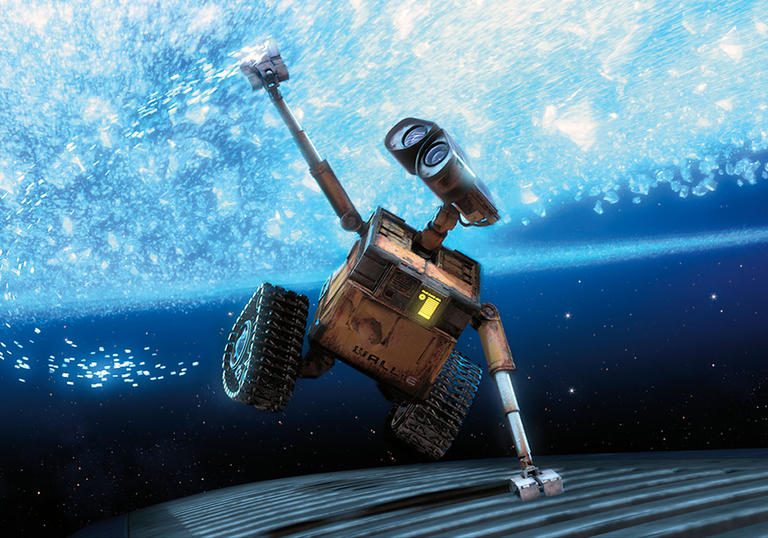 Wall-e flying through the sky underneath the stars