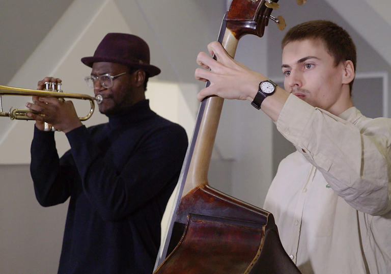 mark kavuma and michael shrimpling playing music in the exhibition into the night at the barbican