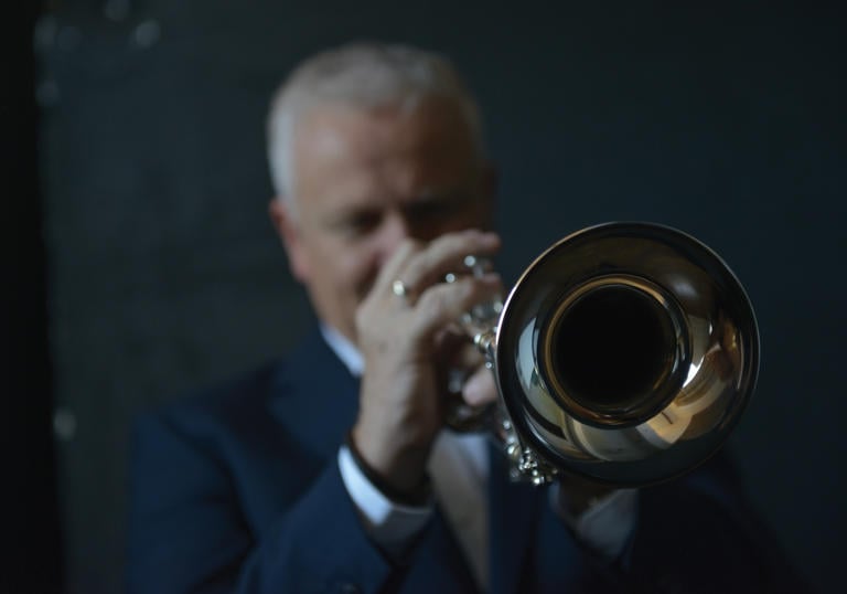 Mike Lovatt playing trumpet