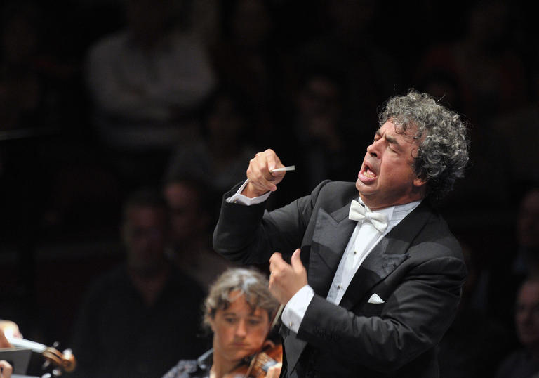 Seymon conducting with great passion and vigor 