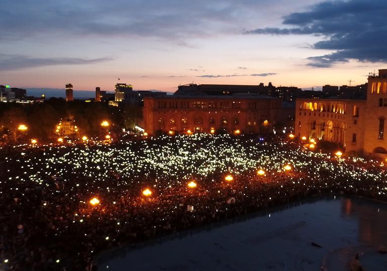 A panoramic landscape showing a protest