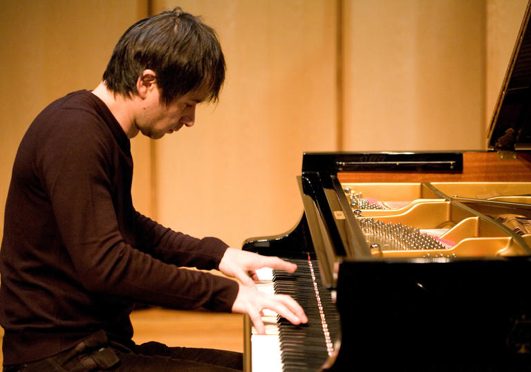 Piotr playing the piano