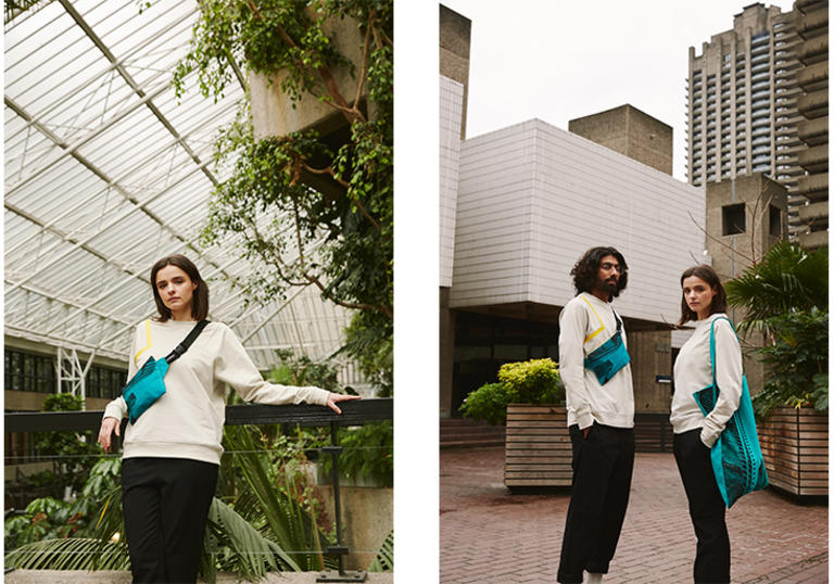 a man and a woman wearing the apparel and lovers collection and standing in front of the barbican