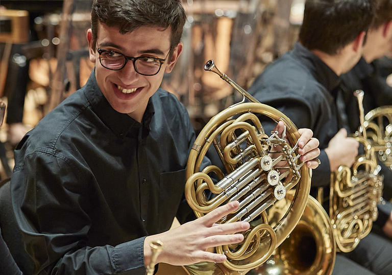 Guildhall School horn player smiling