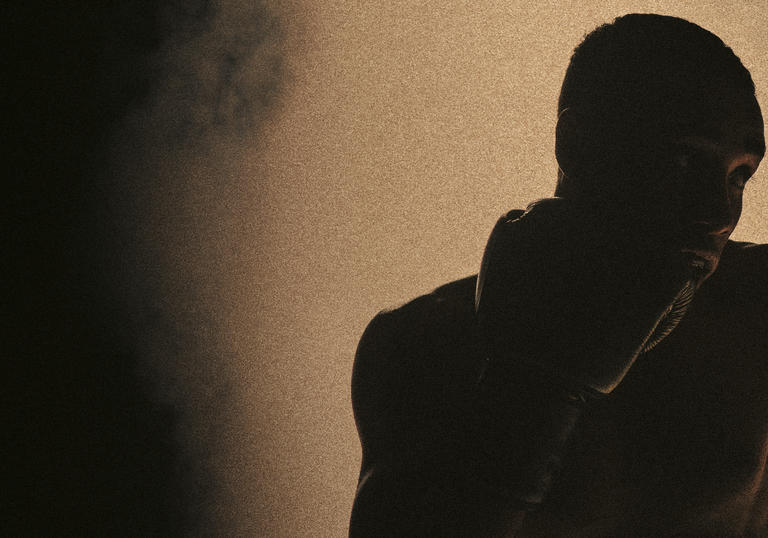 Close up of boxer in silhouette