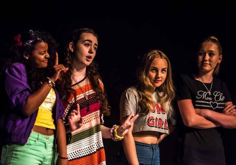 Children on stage at Barbican Box showcase in Manchester