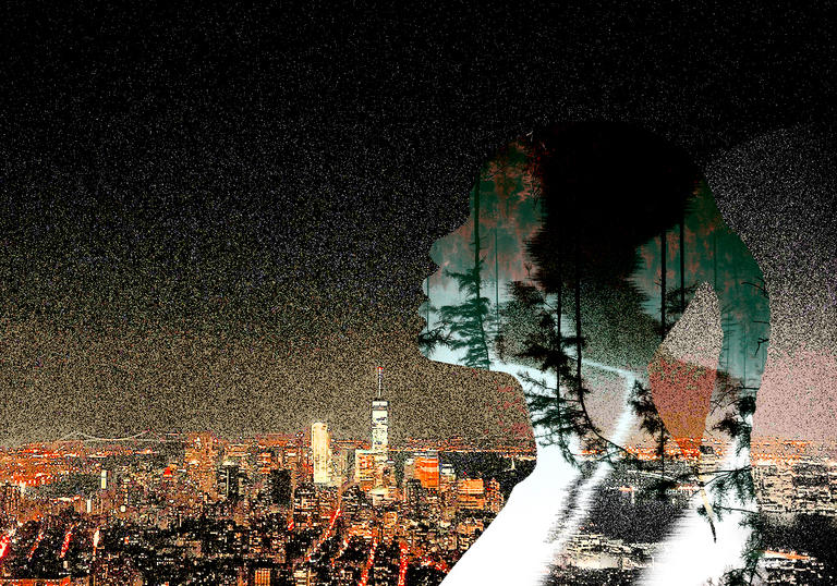 Silhouette of woman's head in profile against a backdrop of a city skyline at night.