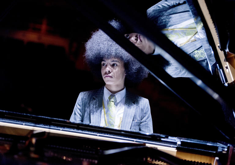 Boy playing piano