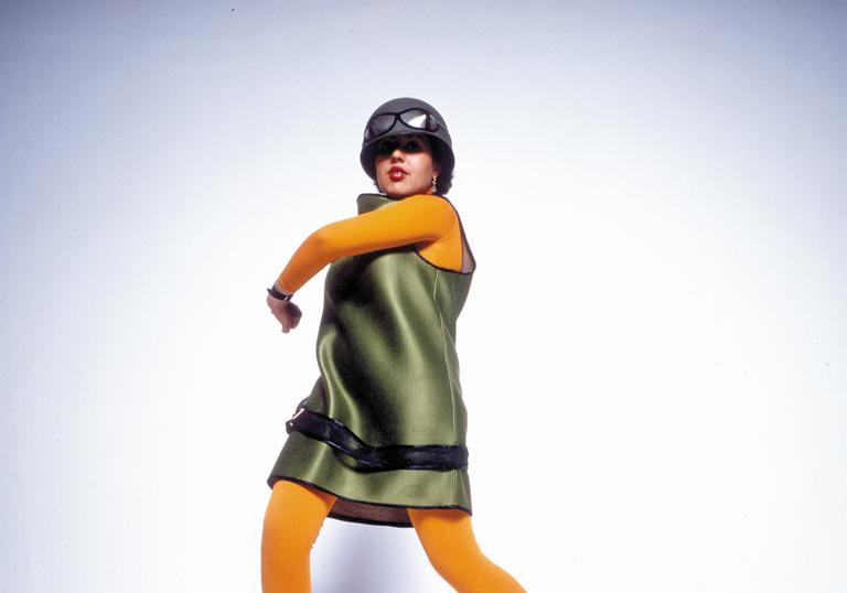 poly styrene dancing in front of a white background