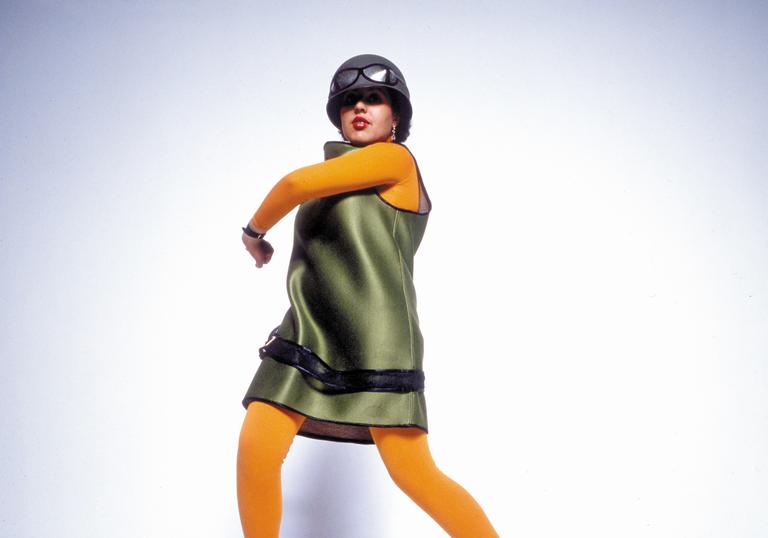 poly styrene dancing in front of a white background