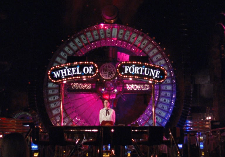 Las Vegas Wheel of Fortune lit up in neon lights