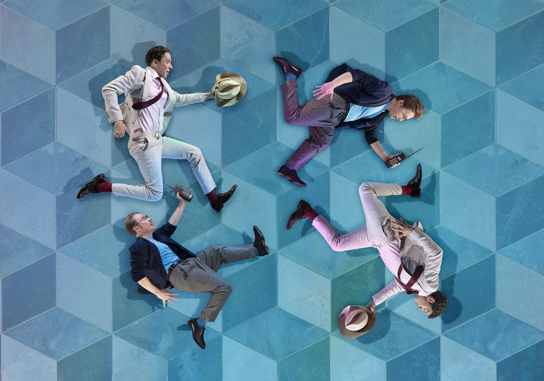 Four cutout images of running men in suits are placed on a blue Escher style tiled background. 