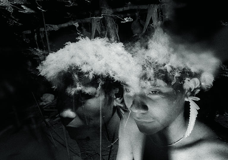 black and white photo of two yanomami young people