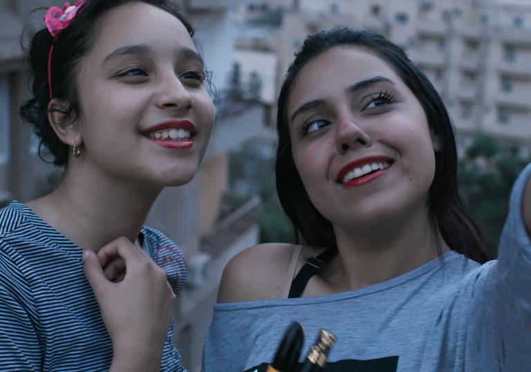 two girls take a selfie together