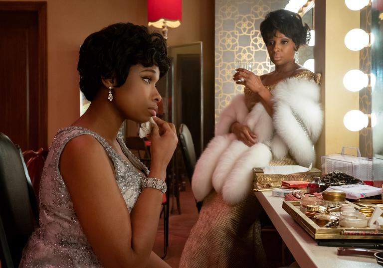 Two women talking in a dressing room