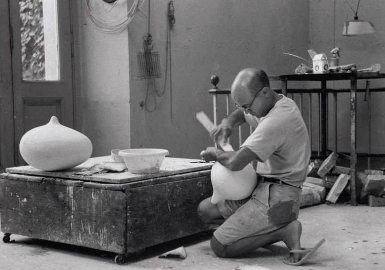 An image of Noguchi in his studio