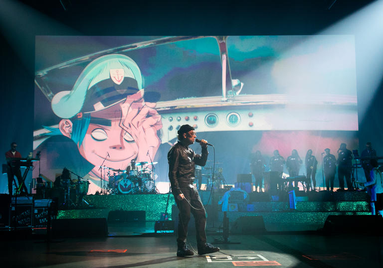 Photo of Gorillaz band member on stage during a live  performance