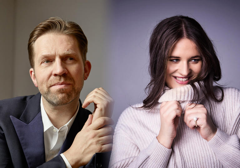 In the left of the image Leif Ove Andsnes is looking to his right slighty, holding his left hand with his right. In the right of the image Lise Davidsen is smiling and looking to her left, holding the neckline of her jumper.