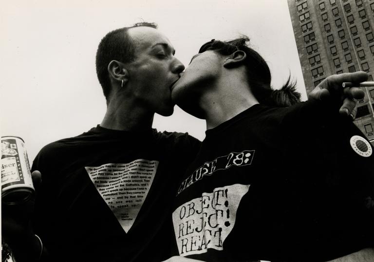 People kissing at LGBTQ+ protest
