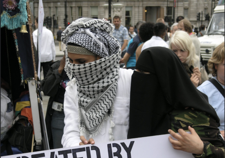 Two LGBTQ+ Muslims at a protest