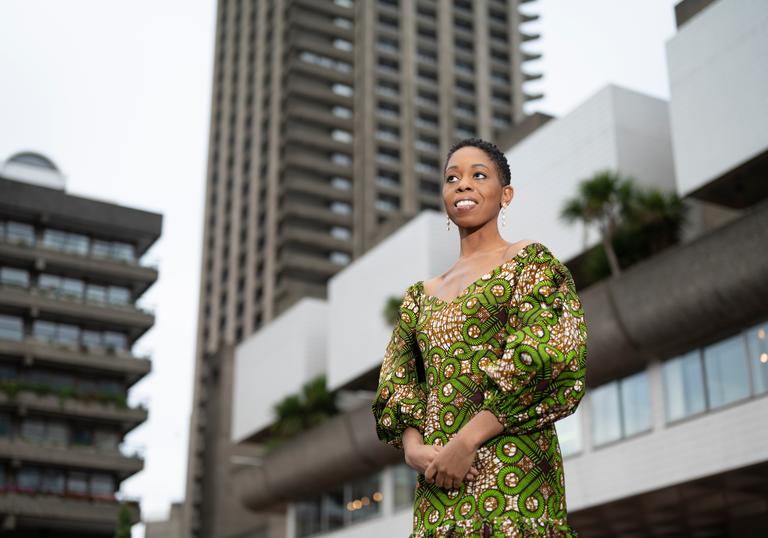 Samantha Ege standing on the Barbican's Lakeside Terrace